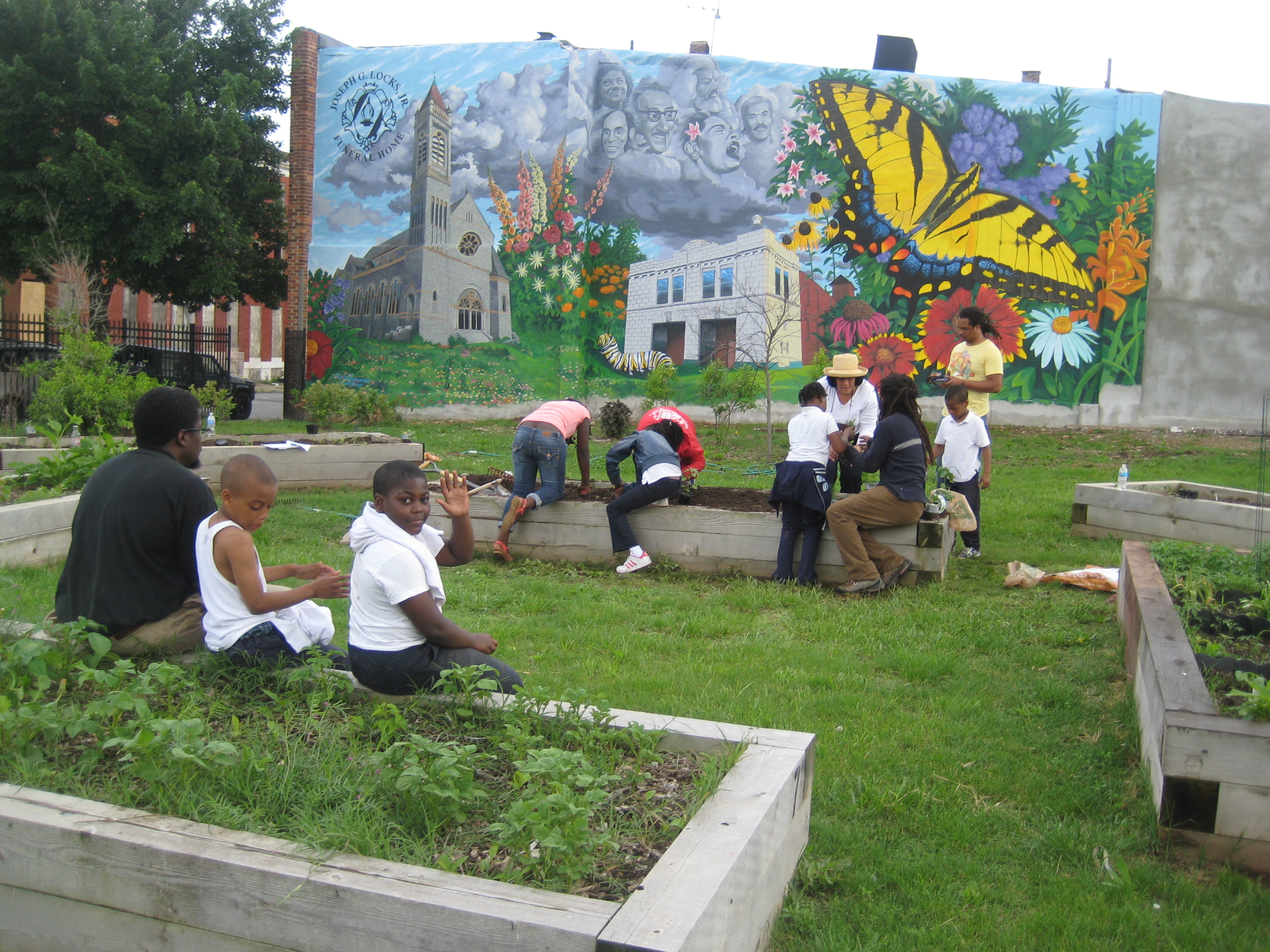 Residents working in a Baltimore City community garden.